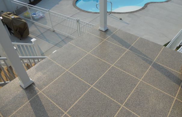 Polyurea-coated floor next to a pool